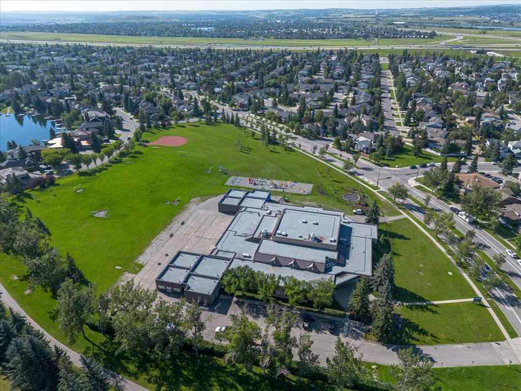 MLS® A2245315 - 88 Sundown Green SE in Sundance Calgary, Residential