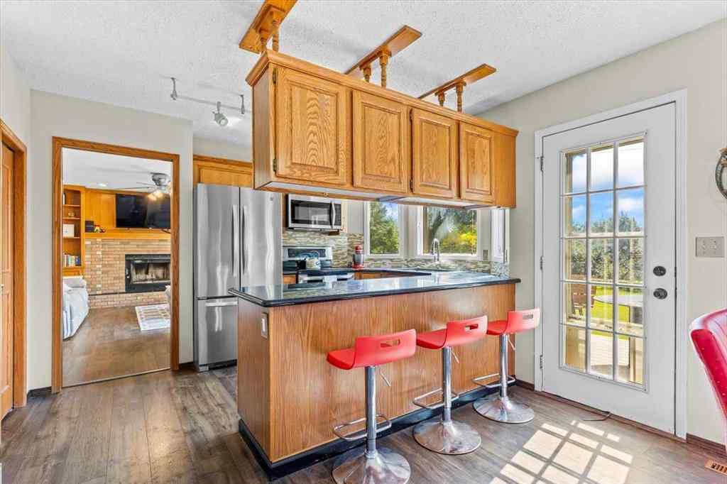 MLS® A2245315 - 88 Sundown Green SE in Sundance Calgary, Residential