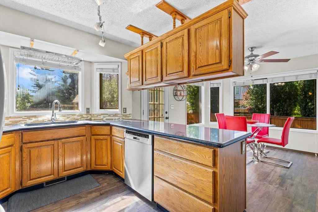 MLS® A2245315 - 88 Sundown Green SE in Sundance Calgary, Residential