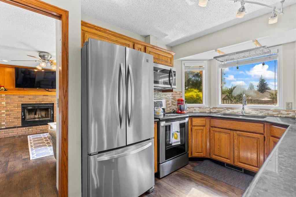 MLS® A2245315 - 88 Sundown Green SE in Sundance Calgary, Residential
