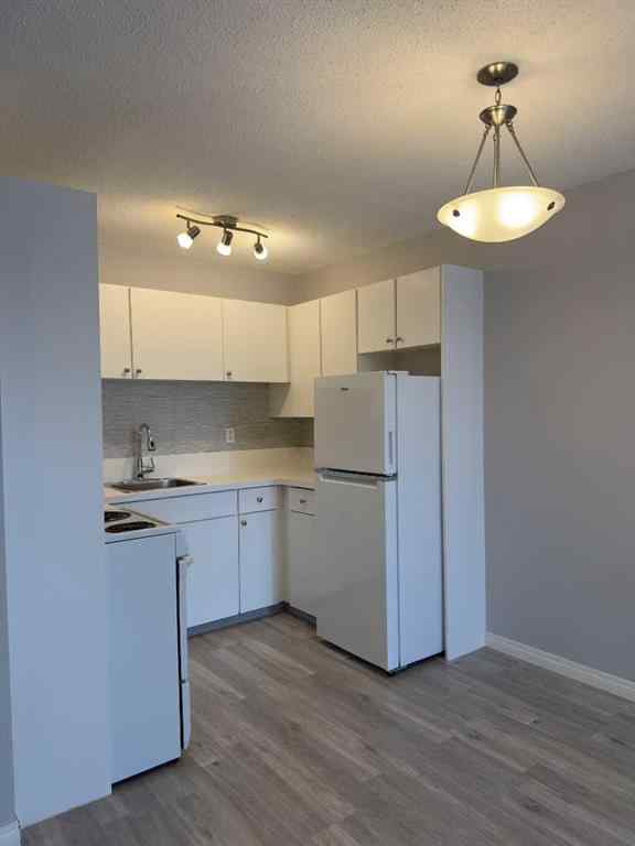 MLS® A2245316 - Unit #406C 5601 Dalton Drive NW in Dalhousie Calgary, Residential