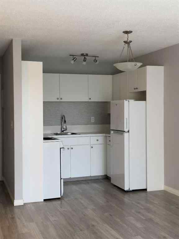 MLS® A2245316 - Unit #406C 5601 Dalton Drive NW in Dalhousie Calgary, Residential