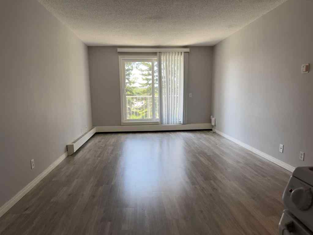 MLS® A2245316 - Unit #406C 5601 Dalton Drive NW in Dalhousie Calgary, Residential
