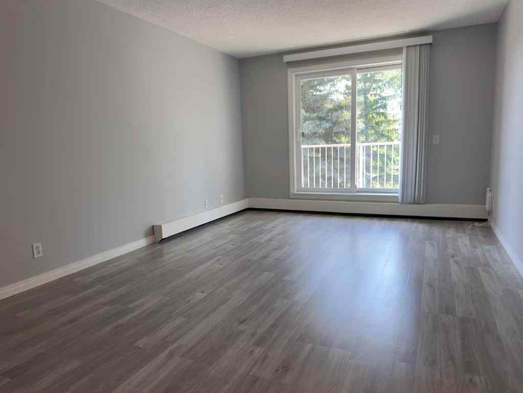 MLS® A2245316 - Unit #406C 5601 Dalton Drive NW in Dalhousie Calgary, Residential