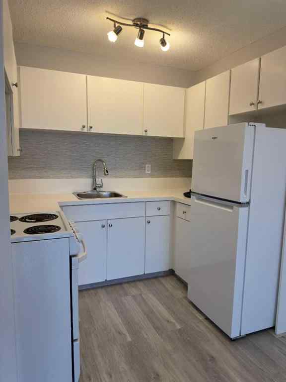 MLS® A2245316 - Unit #406C 5601 Dalton Drive NW in Dalhousie Calgary, Residential