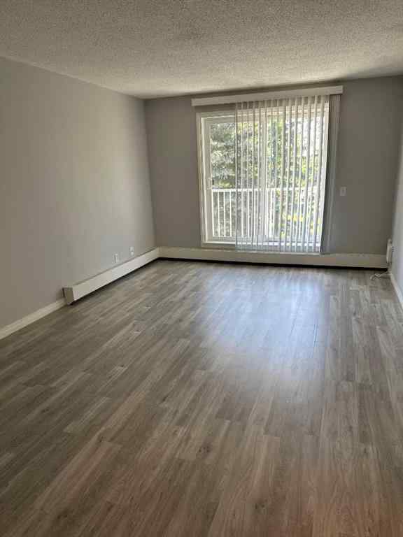 MLS® A2245316 - Unit #406C 5601 Dalton Drive NW in Dalhousie Calgary, Residential