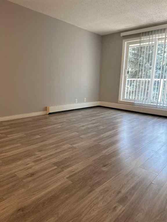 MLS® A2245316 - Unit #406C 5601 Dalton Drive NW in Dalhousie Calgary, Residential