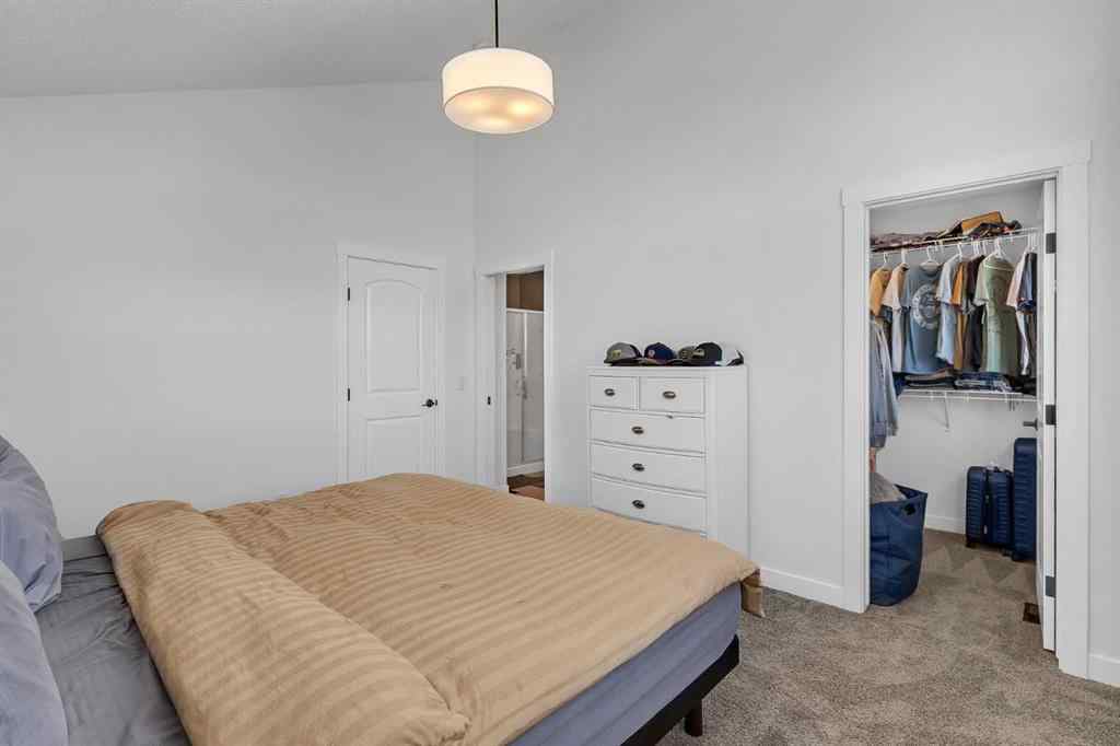 MLS® A2245350 - 21258 SHERIFF KING Street SW in Pine Creek Calgary, Residential