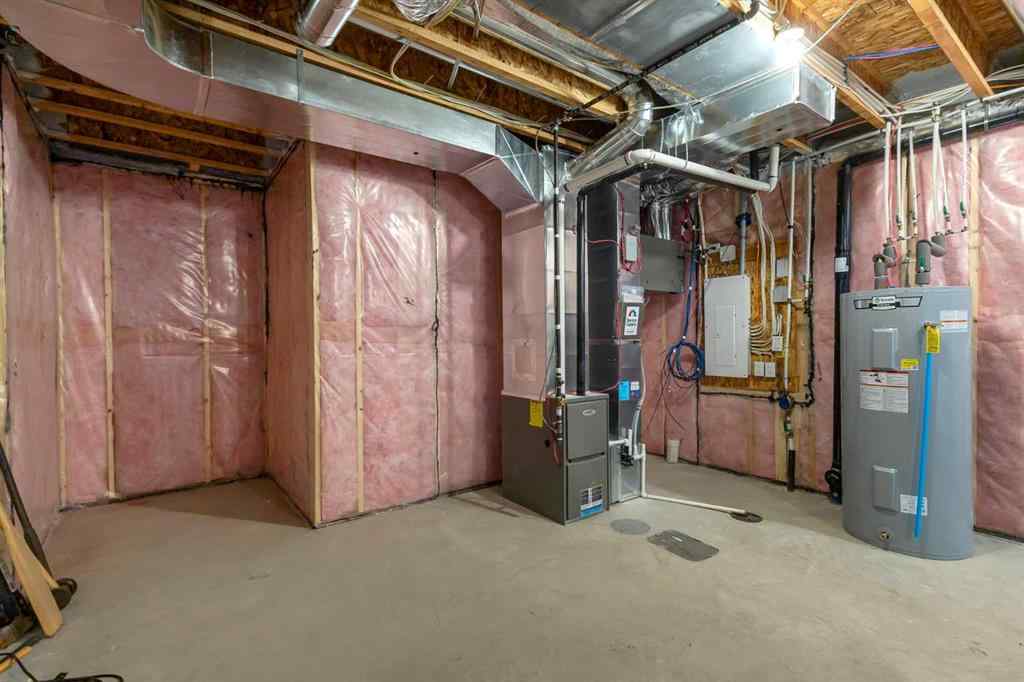 MLS® A2245350 - 21258 SHERIFF KING Street SW in Pine Creek Calgary, Residential