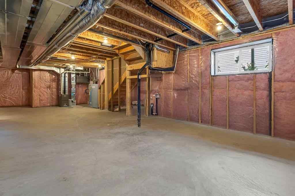 MLS® A2245350 - 21258 SHERIFF KING Street SW in Pine Creek Calgary, Residential