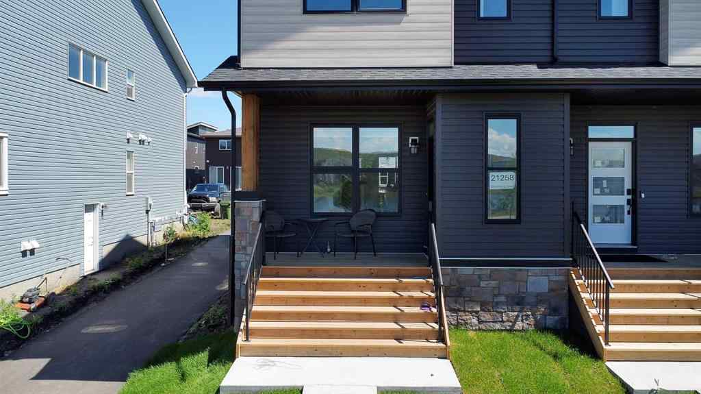 MLS® A2245350 - 21258 SHERIFF KING Street SW in Pine Creek Calgary, Residential