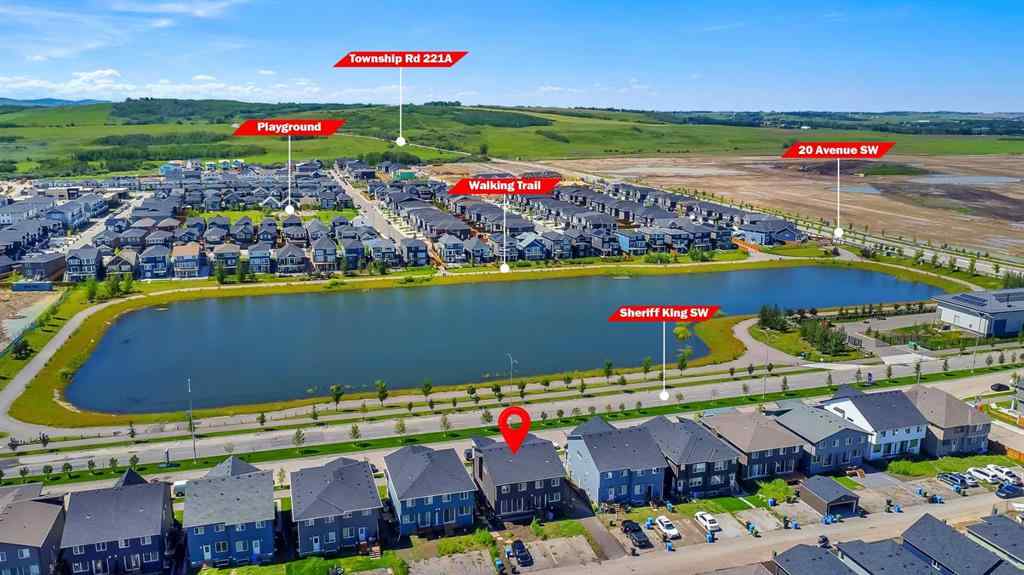 MLS® A2245350 - 21258 SHERIFF KING Street SW in Pine Creek Calgary, Residential