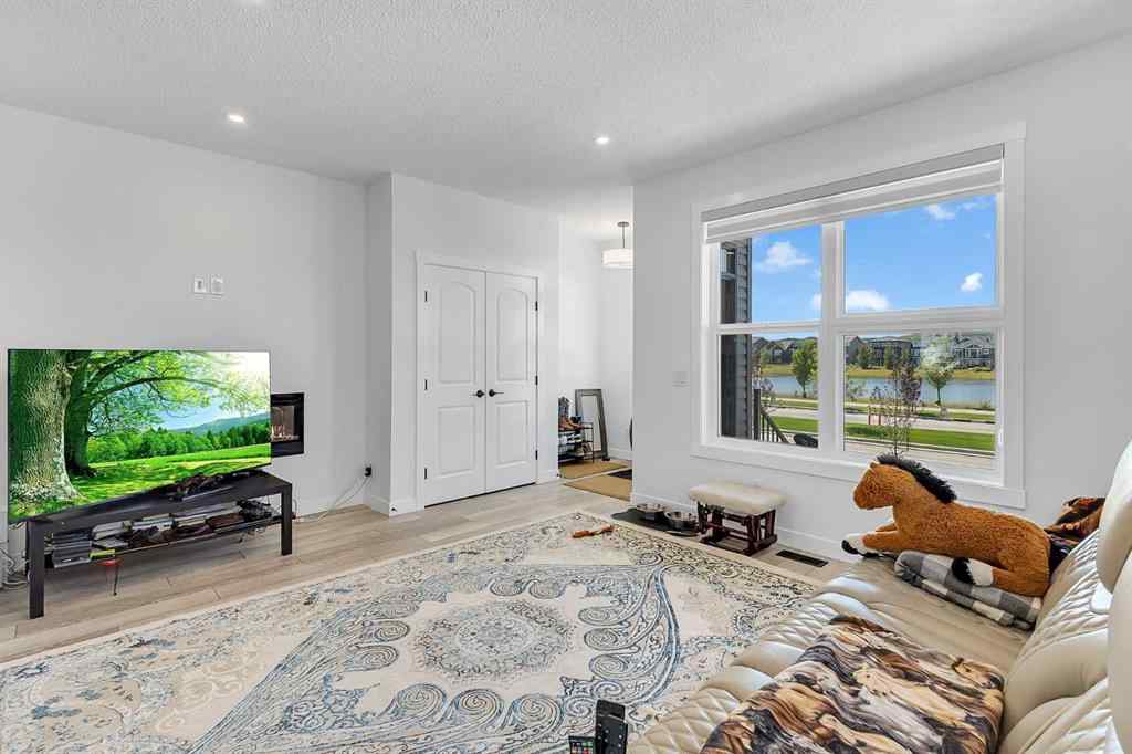 MLS® A2245350 - 21258 SHERIFF KING Street SW in Pine Creek Calgary, Residential