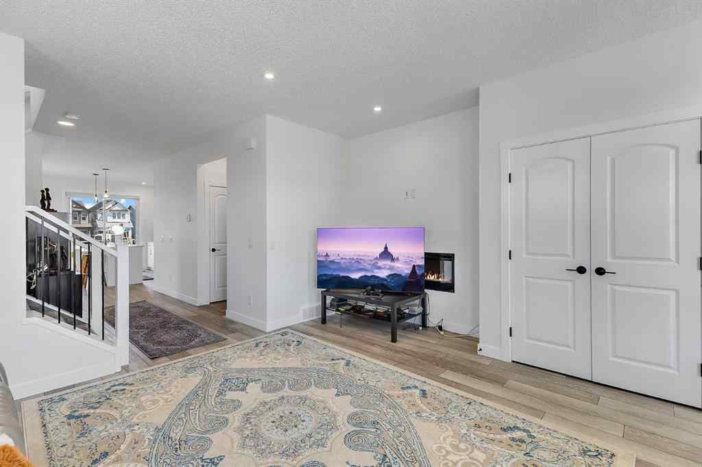 MLS® A2245350 - 21258 SHERIFF KING Street SW in Pine Creek Calgary, Residential