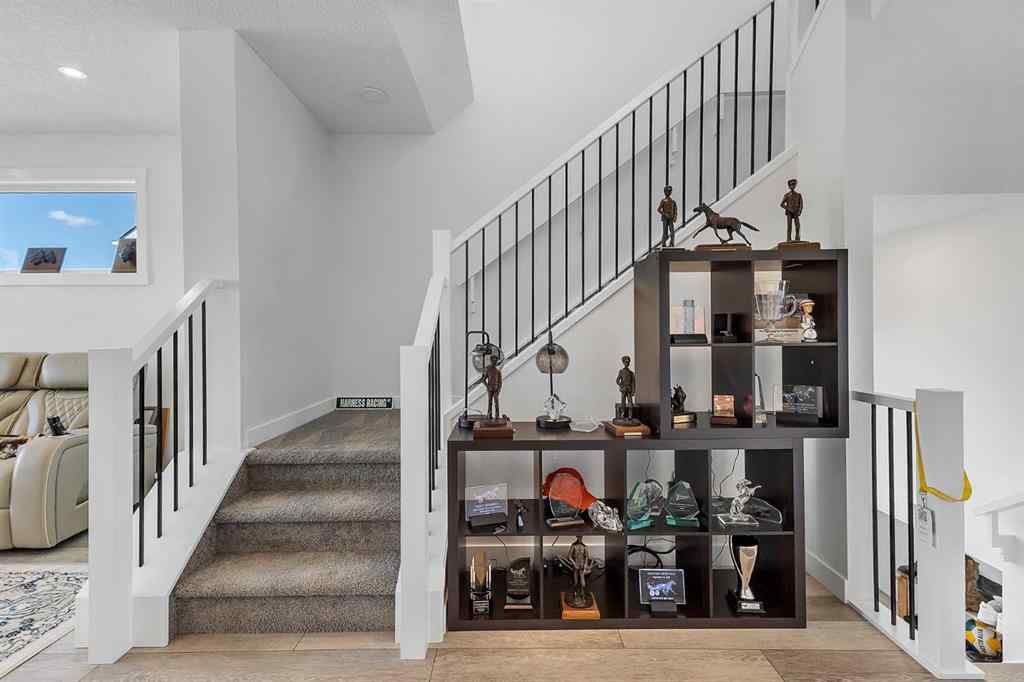 MLS® A2245350 - 21258 SHERIFF KING Street SW in Pine Creek Calgary, Residential