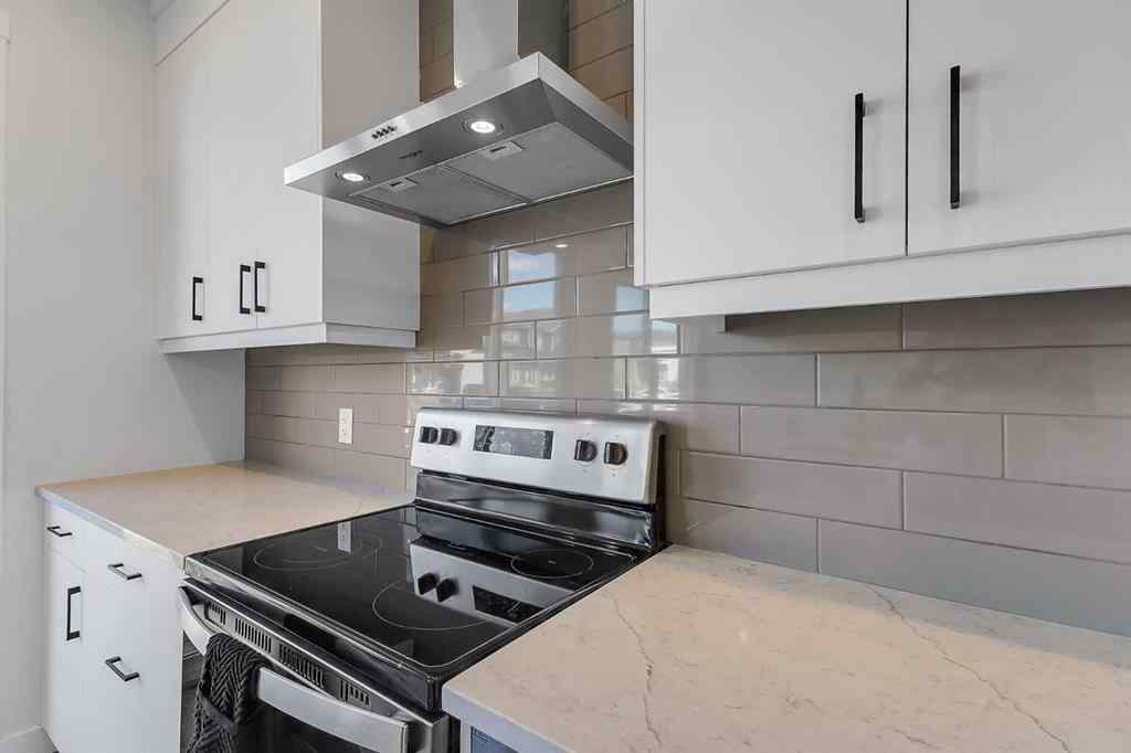 MLS® A2245350 - 21258 SHERIFF KING Street SW in Pine Creek Calgary, Residential