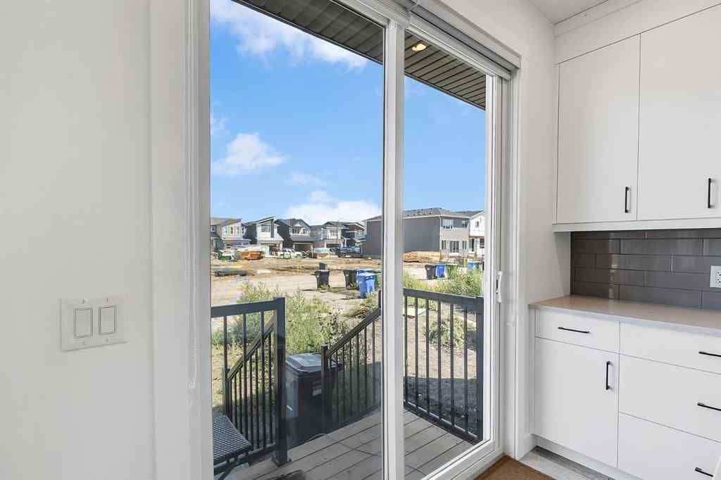 MLS® A2245350 - 21258 SHERIFF KING Street SW in Pine Creek Calgary, Residential