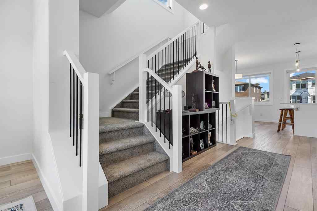 MLS® A2245350 - 21258 SHERIFF KING Street SW in Pine Creek Calgary, Residential