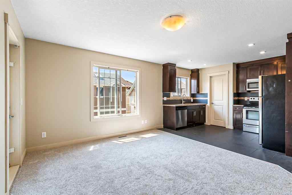 MLS® A2245356 - 973 Channelside Road SW in Canals Airdrie, Residential