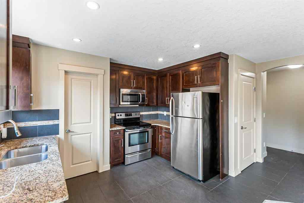 MLS® A2245356 - 973 Channelside Road SW in Canals Airdrie, Residential