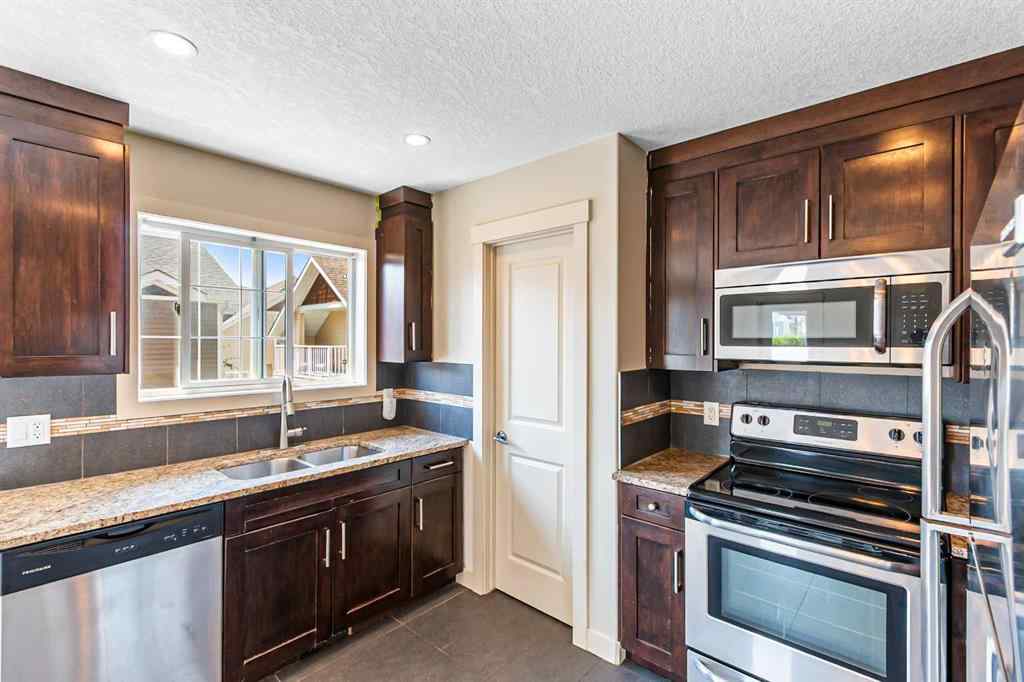 MLS® A2245356 - 973 Channelside Road SW in Canals Airdrie, Residential
