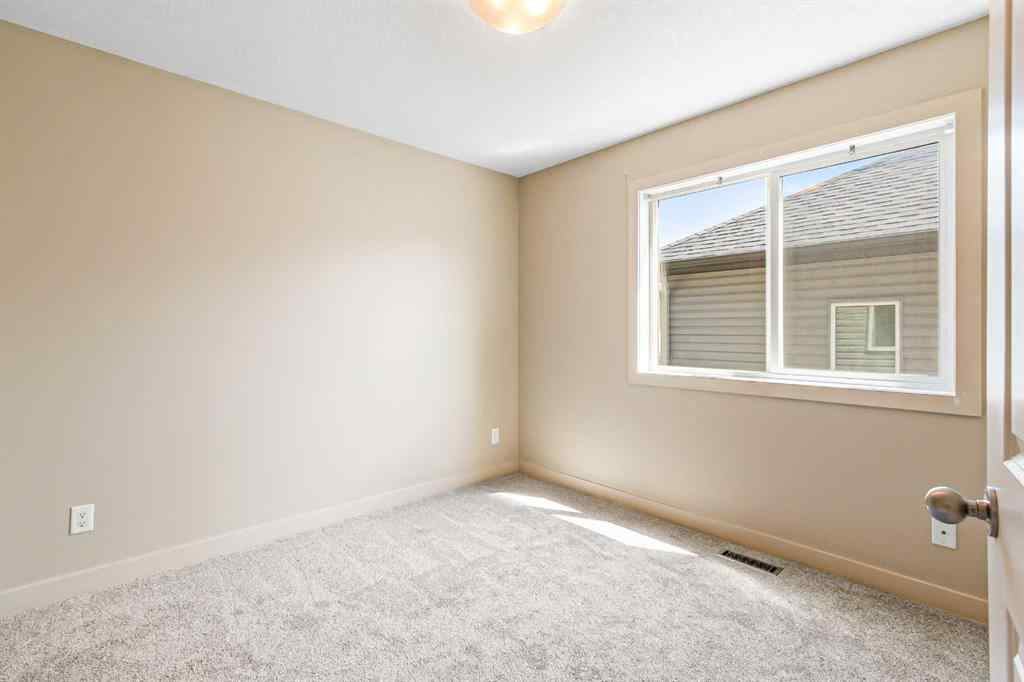 MLS® A2245356 - 973 Channelside Road SW in Canals Airdrie, Residential