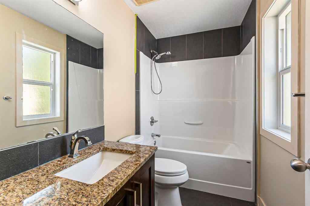 MLS® A2245356 - 973 Channelside Road SW in Canals Airdrie, Residential