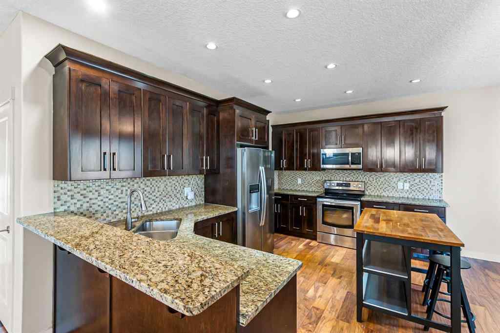 MLS® A2245356 - 973 Channelside Road SW in Canals Airdrie, Residential
