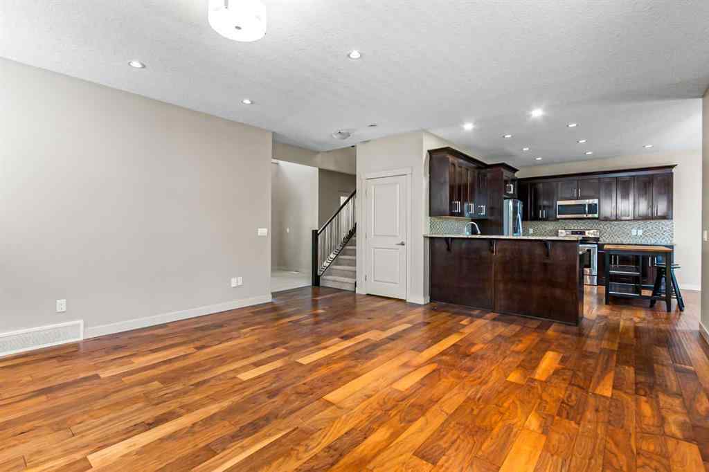 MLS® A2245356 - 973 Channelside Road SW in Canals Airdrie, Residential