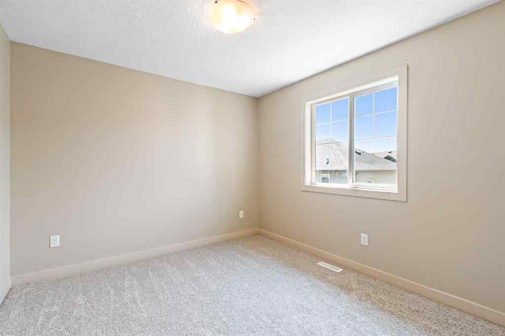 MLS® A2245356 - 973 Channelside Road SW in Canals Airdrie, Residential