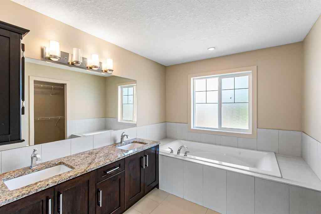 MLS® A2245356 - 973 Channelside Road SW in Canals Airdrie, Residential