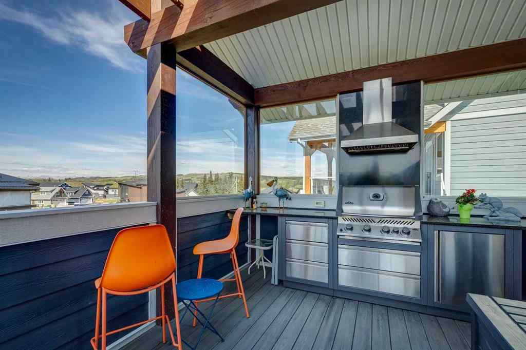 MLS® A2245357 - 405 Cottageclub Cove  in Cottage Club at Ghost Lake Rural Rocky View County, Residential