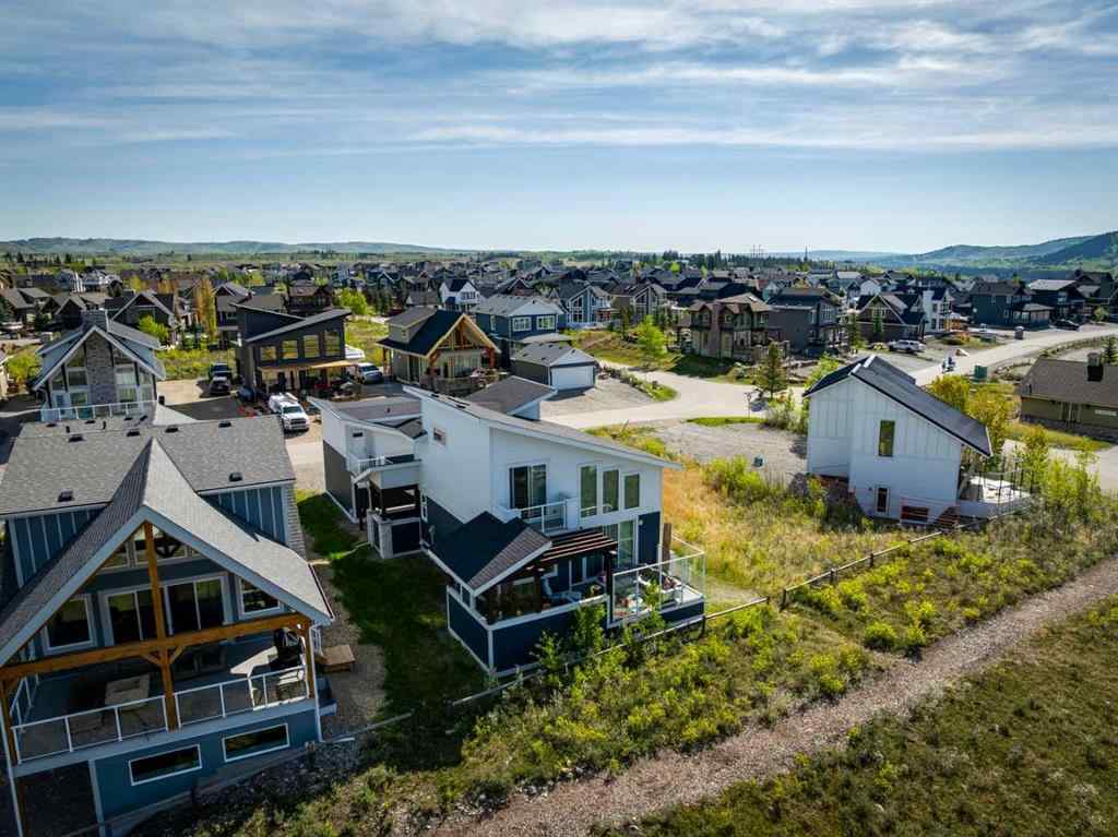 MLS® A2245357 - 405 Cottageclub Cove  in Cottage Club at Ghost Lake Rural Rocky View County, Residential