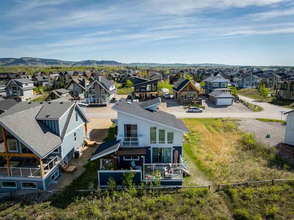 MLS® A2245357 - 405 Cottageclub Cove  in Cottage Club at Ghost Lake Rural Rocky View County, Residential