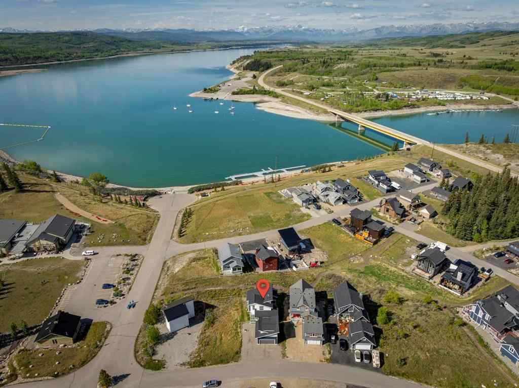 MLS® A2245357 - 405 Cottageclub Cove  in Cottage Club at Ghost Lake Rural Rocky View County, Residential