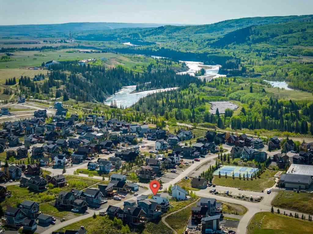 MLS® A2245357 - 405 Cottageclub Cove  in Cottage Club at Ghost Lake Rural Rocky View County, Residential