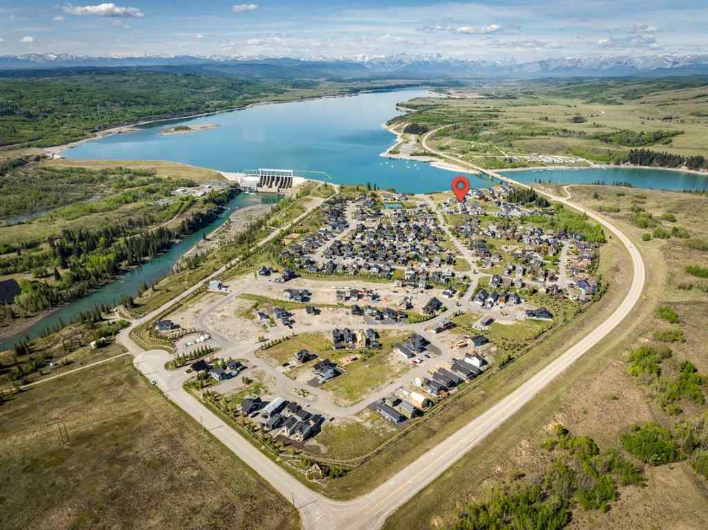 MLS® A2245357 - 405 Cottageclub Cove  in Cottage Club at Ghost Lake Rural Rocky View County, Residential