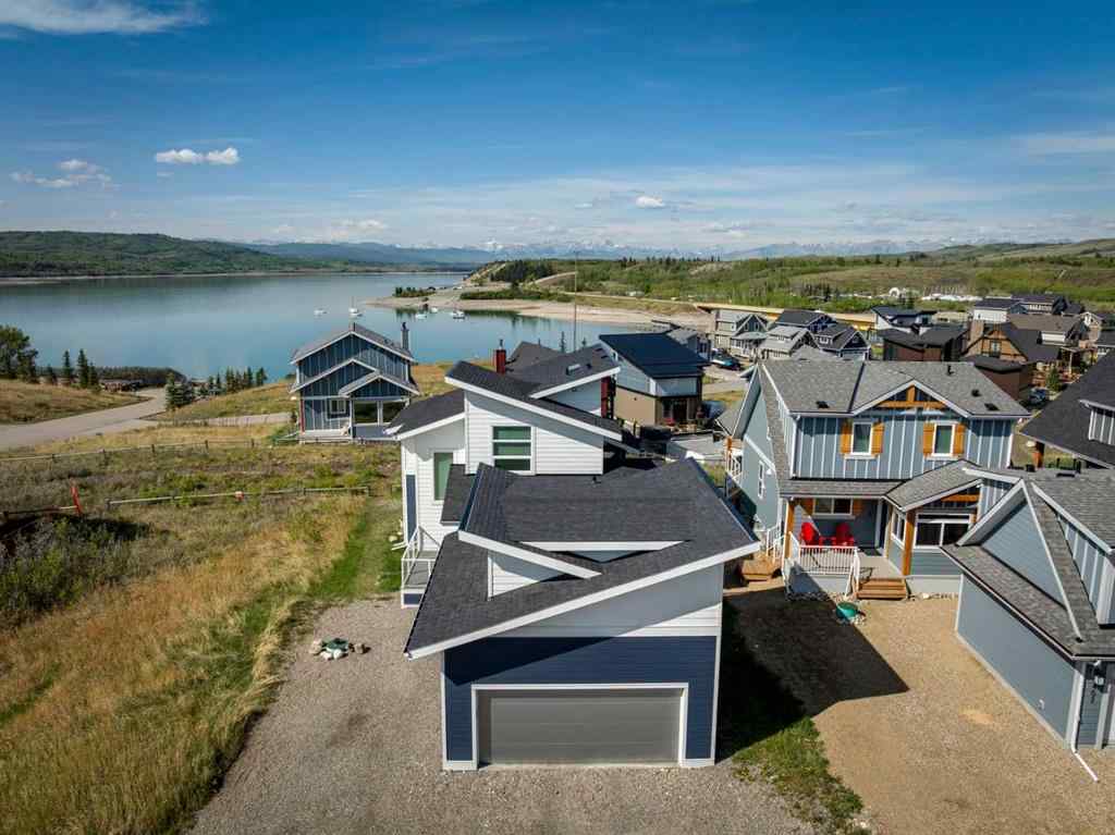 MLS® A2245357 - 405 Cottageclub Cove  in Cottage Club at Ghost Lake Rural Rocky View County, Residential