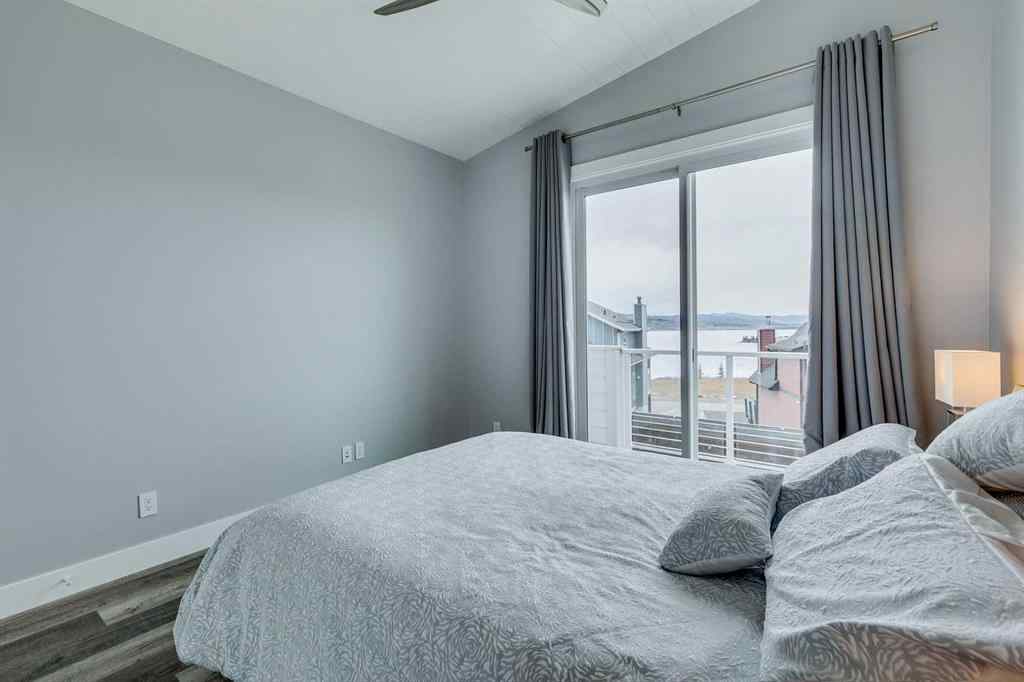 MLS® A2245357 - 405 Cottageclub Cove  in Cottage Club at Ghost Lake Rural Rocky View County, Residential