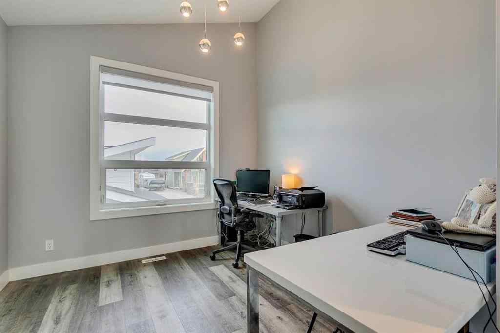 MLS® A2245357 - 405 Cottageclub Cove  in Cottage Club at Ghost Lake Rural Rocky View County, Residential
