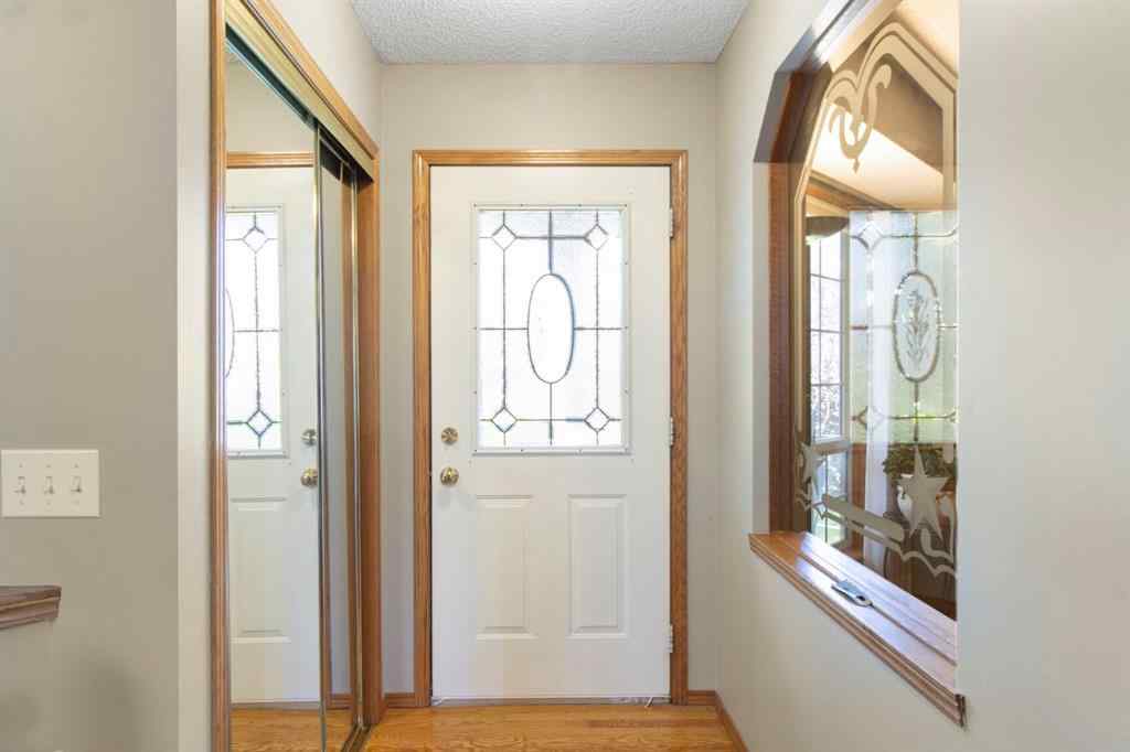 MLS® A2245374 - 21 Arbour Ridge Park NW in Arbour Lake Calgary, Residential