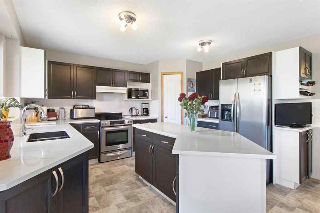 MLS® A2245374 - 21 Arbour Ridge Park NW in Arbour Lake Calgary, Residential