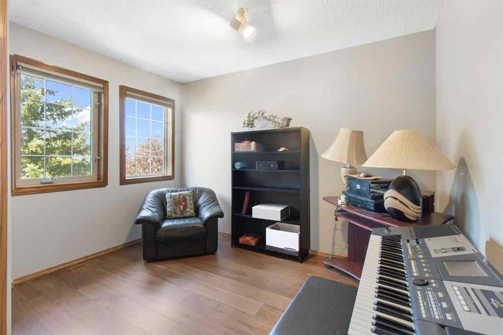 MLS® A2245374 - 21 Arbour Ridge Park NW in Arbour Lake Calgary, Residential