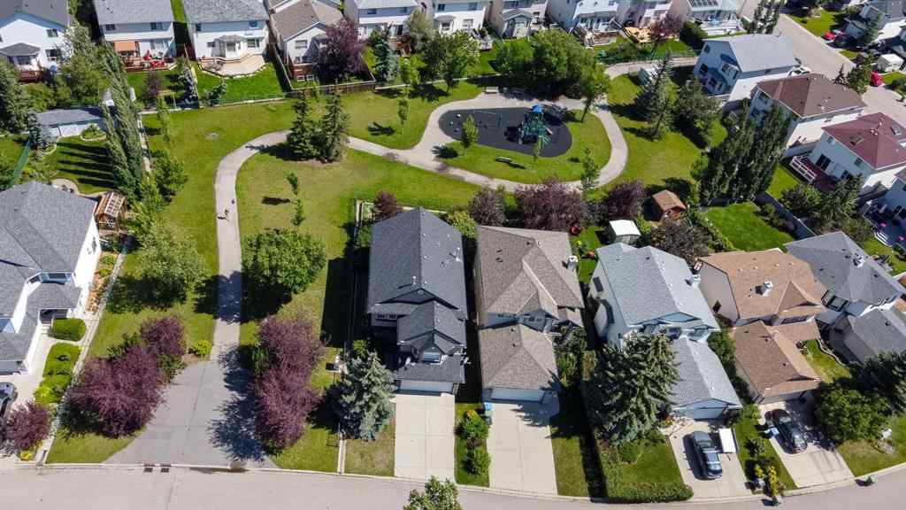 MLS® A2245374 - 21 Arbour Ridge Park NW in Arbour Lake Calgary, Residential