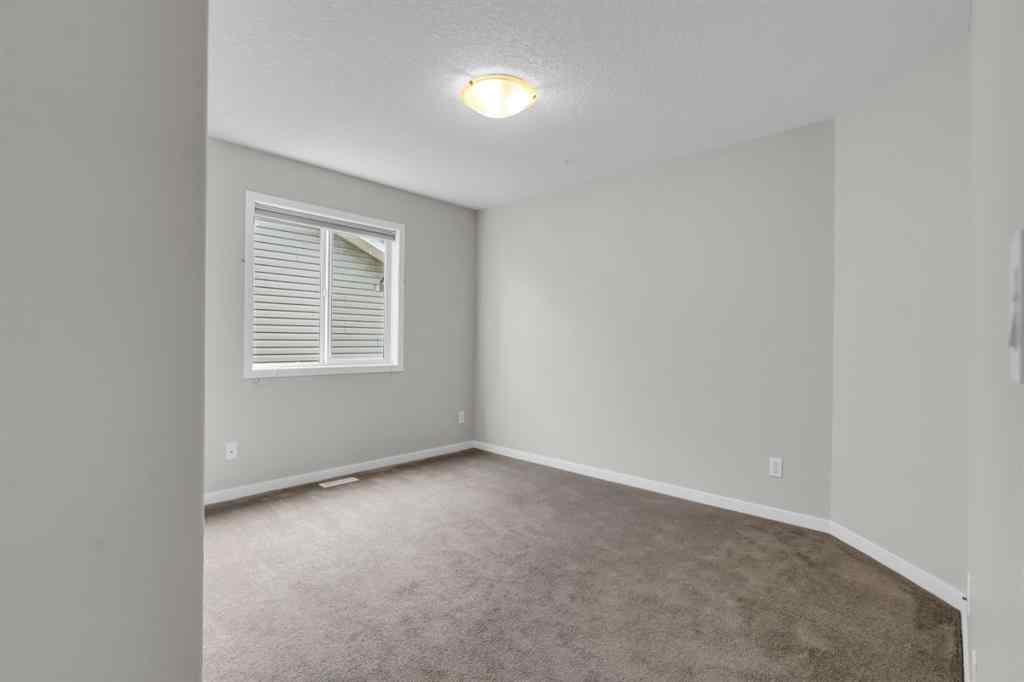 MLS® A2245382 - 16 Cougartown Close SW in Cougar Ridge Calgary, Residential