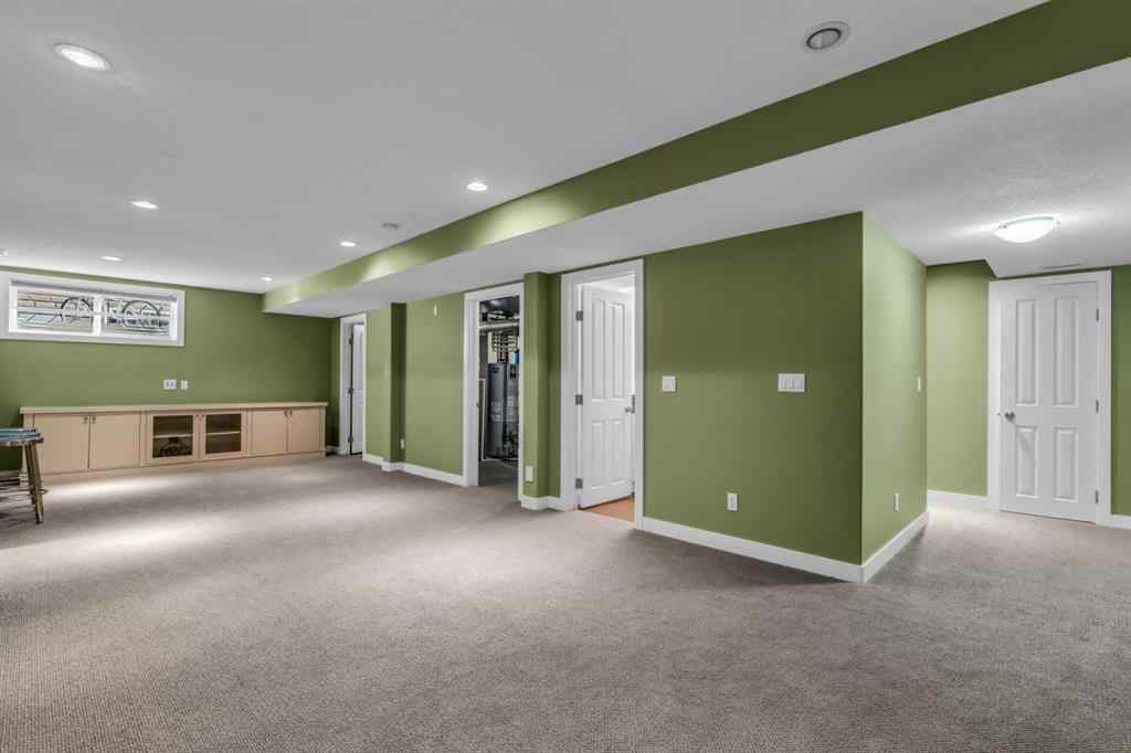 MLS® A2245382 - 16 Cougartown Close SW in Cougar Ridge Calgary, Residential
