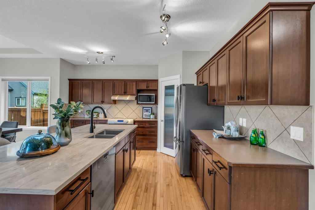 MLS® A2245382 - 16 Cougartown Close SW in Cougar Ridge Calgary, Residential