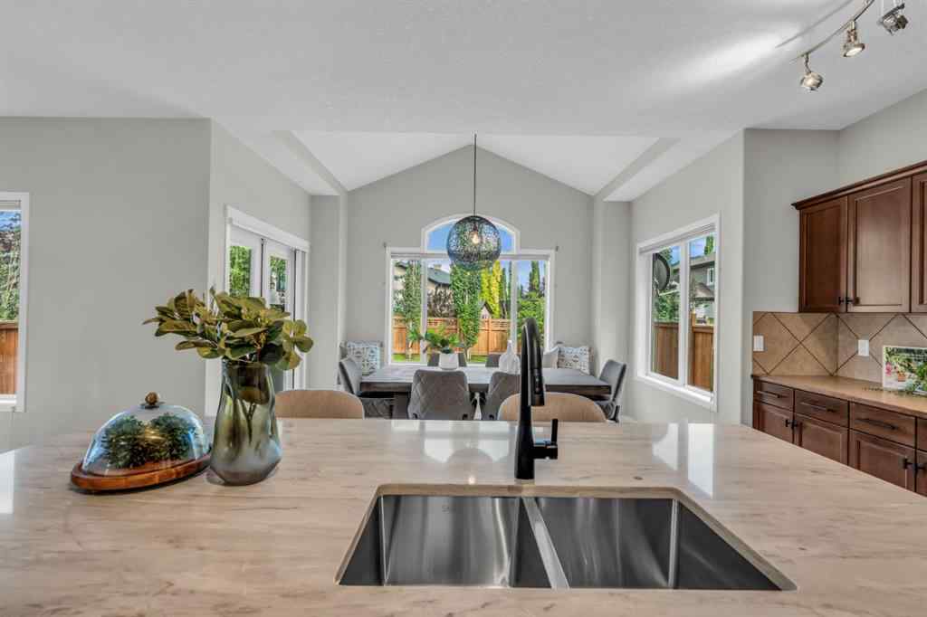 MLS® A2245382 - 16 Cougartown Close SW in Cougar Ridge Calgary, Residential