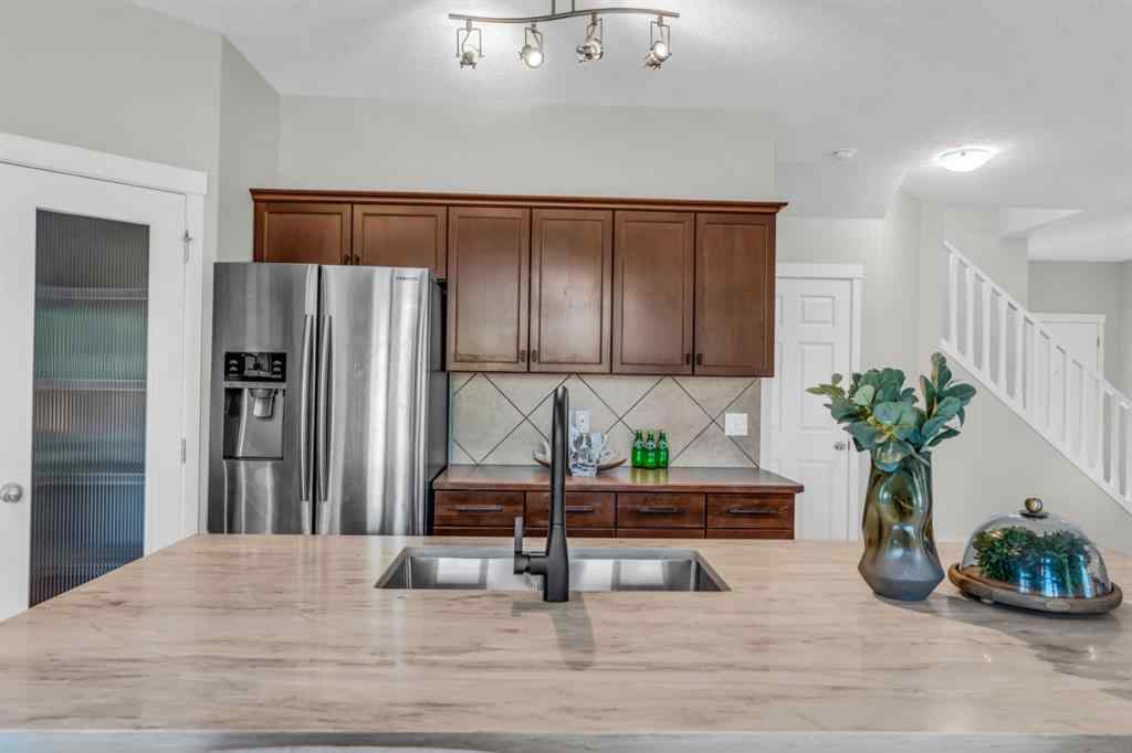 MLS® A2245382 - 16 Cougartown Close SW in Cougar Ridge Calgary, Residential