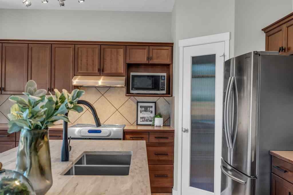 MLS® A2245382 - 16 Cougartown Close SW in Cougar Ridge Calgary, Residential